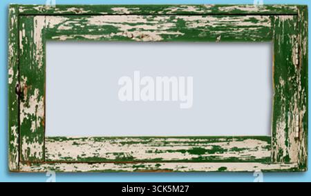 A weathered green wooden frame with a distressed finish, designed to hold a picture or artwork. Stock Photo