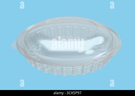 A clear plastic food container with a domed lid, commonly used for takeout or storage. Stock Photo
