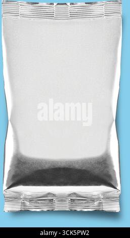 A clear plastic or foil pouch, typically used for packaging food or snacks. Stock Photo