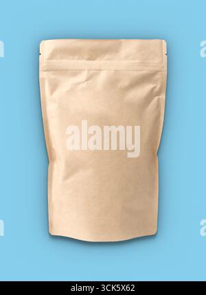 A plain, resealable kraft paper bag designed for packaging various products. Stock Photo