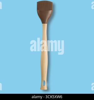 A kitchen brush with a silicone head and wooden handle, used for applying sauces or oils while cooking. Stock Photo