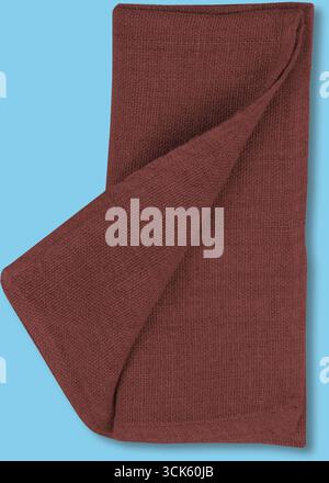 A folded, textured kitchen towel in a warm reddish-brown color, suitable for drying dishes or hands. Stock Photo