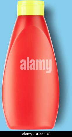 A red plastic bottle with a yellow cap, commonly used for dispensing condiments like ketchup or sauce. Stock Photo