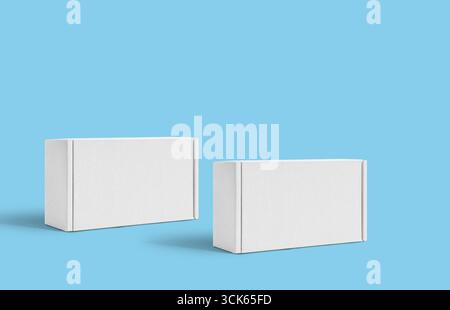 Two plain white rectangular boxes positioned side by side, suggesting packaging or storage. Stock Photo