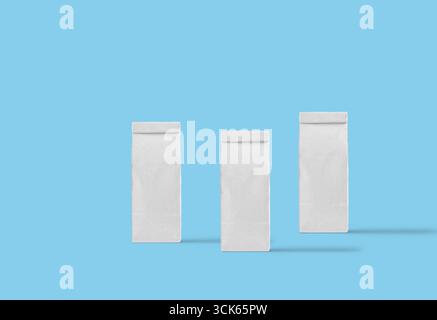 Three plain rectangular packages arranged in a row, likely for packaging or storage purposes. Stock Photo