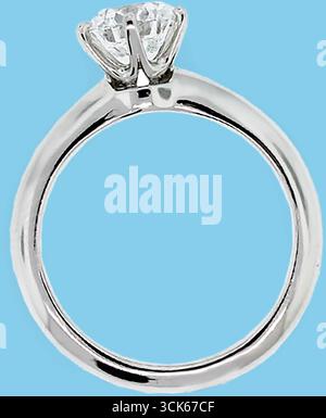 A close-up of a diamond engagement ring showcasing a sparkling stone set in a sleek metal band. Stock Photo