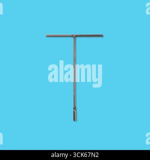 A T-shaped tool commonly used for tightening or loosening fasteners. Stock Photo