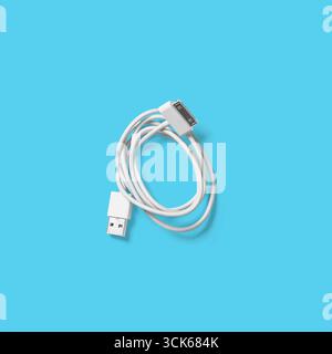 A white USB cable with connectors on both ends, used for data transfer and charging devices. Stock Photo