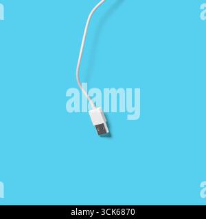 A close-up of a USB cable connector, typically used for data transfer and charging electronic devices. Stock Photo