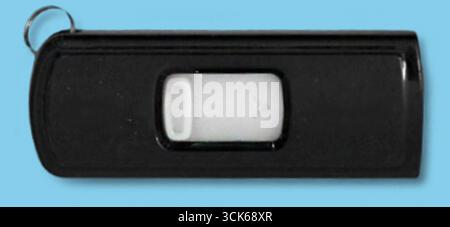 A compact USB flash drive designed for data storage and transfer. Stock Photo