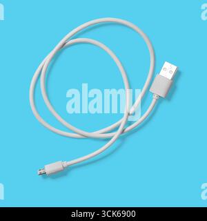 A gray USB cable with one standard USB connector and one smaller connector, used for data transfer and charging devices. Stock Photo