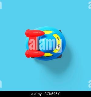 A colorful toy car designed for children, featuring a friendly face and bright colors. Stock Photo