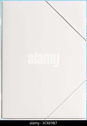 A minimalist white notebook with a unique geometric design on the cover. Stock Photo