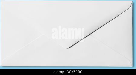 A plain white envelope with a sealed flap, commonly used for mailing letters or documents. Stock Photo
