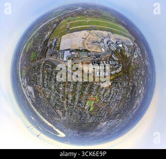 Aerial view, Duesseldorf Airport DUS airport grounds and city, on the A44 motorway, surrounded by autumnal deciduous trees, earth globe, fisheye image Stock Photo