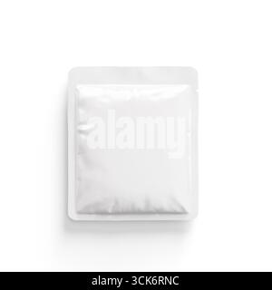 A plain white packet, likely containing a powder or condiment, designed for single-use convenience. Stock Photo