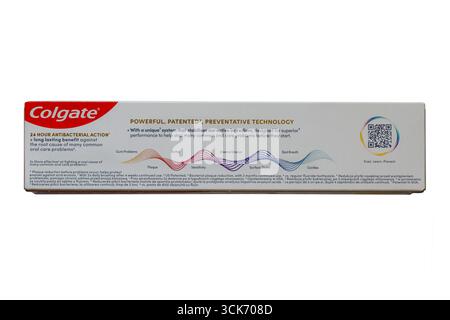Information on back of box of Colgate Total Active Prevention fresh mint toothpaste isolated on white background Stock Photo