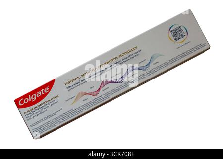 Information on back of box of Colgate Total Active Prevention fresh mint toothpaste isolated on white background Stock Photo