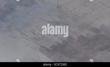 A textured abstract design featuring muted colors and layered patterns, suitable for backgrounds or artistic projects. Stock Photo