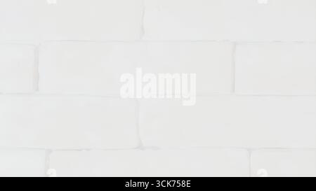 A seamless pattern of white brick walls, creating a clean and minimalist background suitable for various design projects. Stock Photo