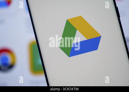 Google Drive icon with a triangular shape in blue, green, and yellow Stock Photo