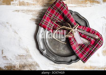 Rustic table setting with vintage cutlery on wooden table Stock Photo