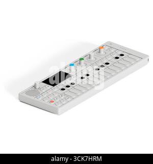 A compact music synthesizer with keys and knobs for sound creation and manipulation. Stock Photo