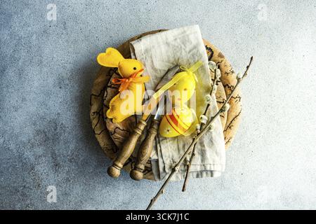 Easter dinner table settinf with colored eggs served on the table Stock Photo
