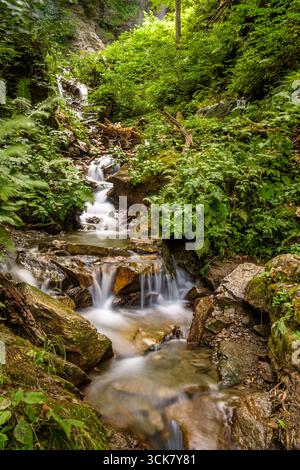 Small waterfall at the Finsterbachfall in Austria Stock Photo