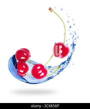 Cherries with splashes of fresh water close-up on white background Stock Photo