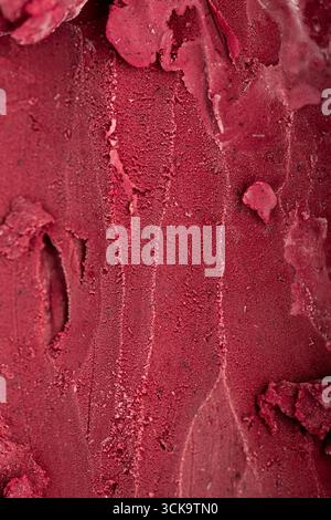 Close-up texture of rich red berry sorbet, vibrant and refreshing frozen dessert background Stock Photo