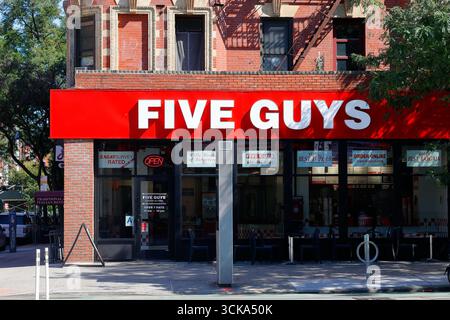 Five Guys, 188 2nd Ave, New York, NYC storefront of a fast food hamburger chain restaurant in Manhattan's East Village. Stock Photo