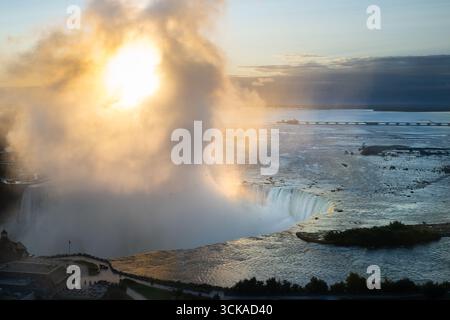 Above Niagara Falls, sunrise in mist Horseshoe Falls waterfall - Ontario Canada tourism holiday destination Stock Photo