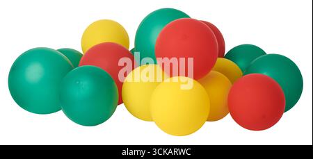 dense cluster of bright solid-colored balloons isolated white background, mix of red, yellow and green, celebrating party and festive occasion Stock Photo