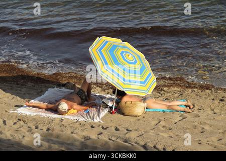 Couple on the beach. Mijas Costa, Málaga, Spain. Stock Photo