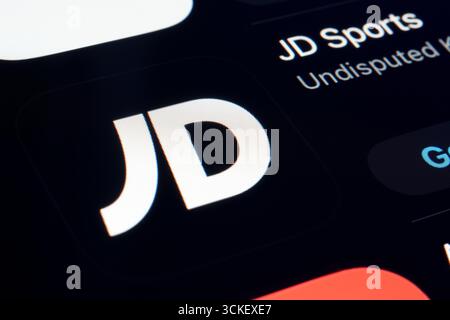 JD Sports logo on store front window, modern retail building with glass ...