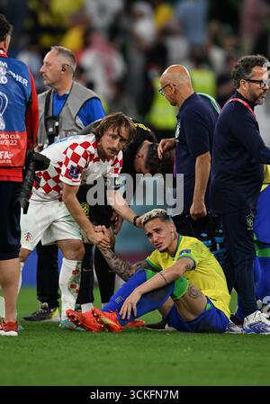 Luka Modric providing a hand of consolation as Brazil mourns its loss in the FIFA World Cup Quarterfinals. Stock Photo