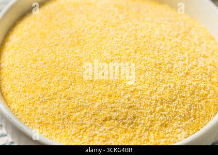Organic Dry Polenta Corn Meal Flour in a Bowl Stock Photo