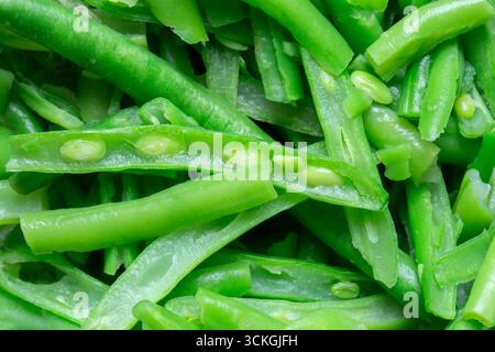 Fresh green beans cut sliced background backdrop. Grow your own concept. Stock Photo