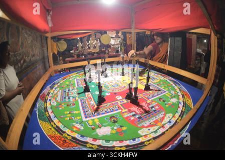 Monks at Thiksey Monastery are building a mandara.The mandala is a spiritual symbol in Buddhism and Hinduism. Stock Photo