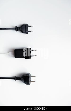 Various kinds of power adapters isolated on white background Stock Photo
