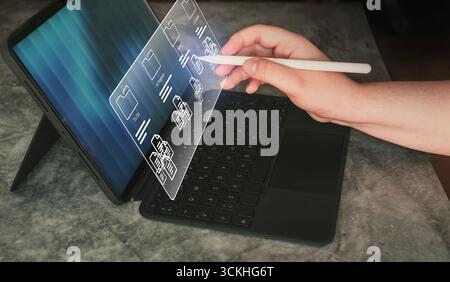 Business developer. Woman use software for project management on digital tablet with futuristic interface. Artificial Intelligence tool. Stock Photo