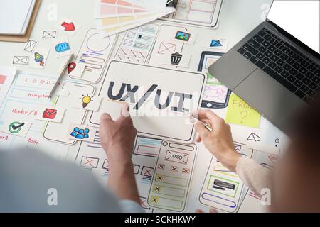 UXUI design brainstorming session with sketches and digital tools Stock Photo