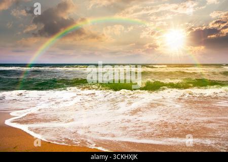 dramatic sea view with overcast sky above horizon at sunset. vacation disaster with dark moody atmosphere. beauty and danger of nature at the coast in Stock Photo
