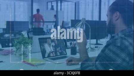 Holding smartphone joining online call plaid-shirted man at office desk using laptop, copy space Stock Photo