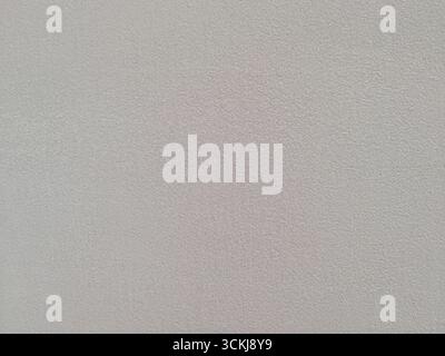 Close up of plain gray wall surface with fine textured finish . High quality photo Stock Photo