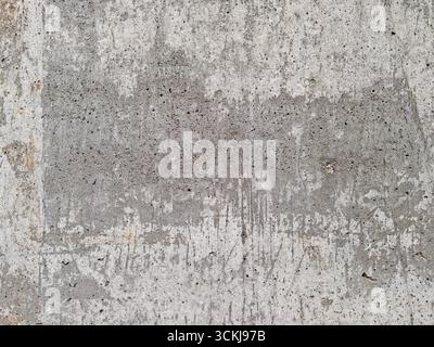 Close up of old concrete wall with stains scratches and weathered texture . High quality photo Stock Photo
