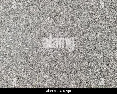 Close up of rough gray asphalt surface with fine texture . High quality photo Stock Photo