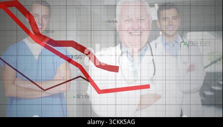 Displaying doctors in uniforms showing descending data in hospital with red line and stethoscope Stock Photo