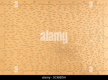 Golden solved jigsaw puzzle, blank pattern abstract textured backdrop for product or text Stock Photo